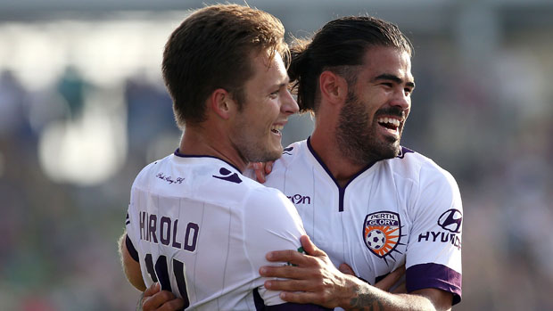 Chris Harold and Aryn Williams celebrate a goal in Glory's 6-1 win over Newcastle.