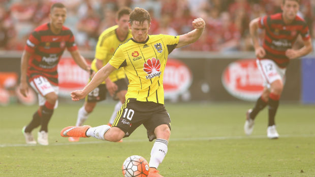 Wellington Phoenix midfielder Michael McGlinchey scores against the Wanderers from the penalty spot.
