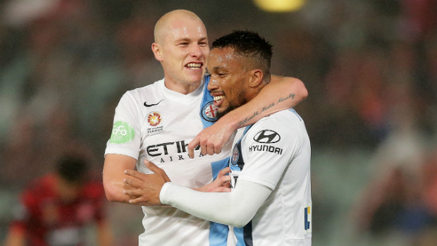 City's Aaron Mooy hugs teammate Harry Novillo after his equaliser on Friday night.